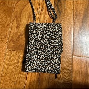 Multiple compartment, cross body travel bag with adjustable strap
